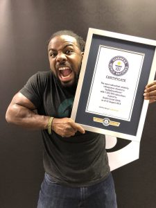 Xavier Woods accepting award for UpUpDownDown